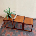 Load image into Gallery viewer, Vintage Nesting Tables by E. Gomme for G-Plan Perfect for adding versatility to any living space, these nesting tables offer both style and functionality, serving as side tables or separate accents. 
