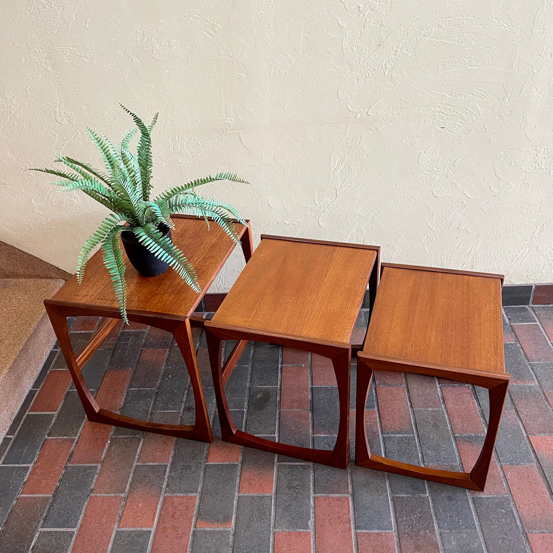 Vintage Nesting Tables by E. Gomme for G-Plan Perfect for adding versatility to any living space, these nesting tables offer both style and functionality, serving as side tables or separate accents. 