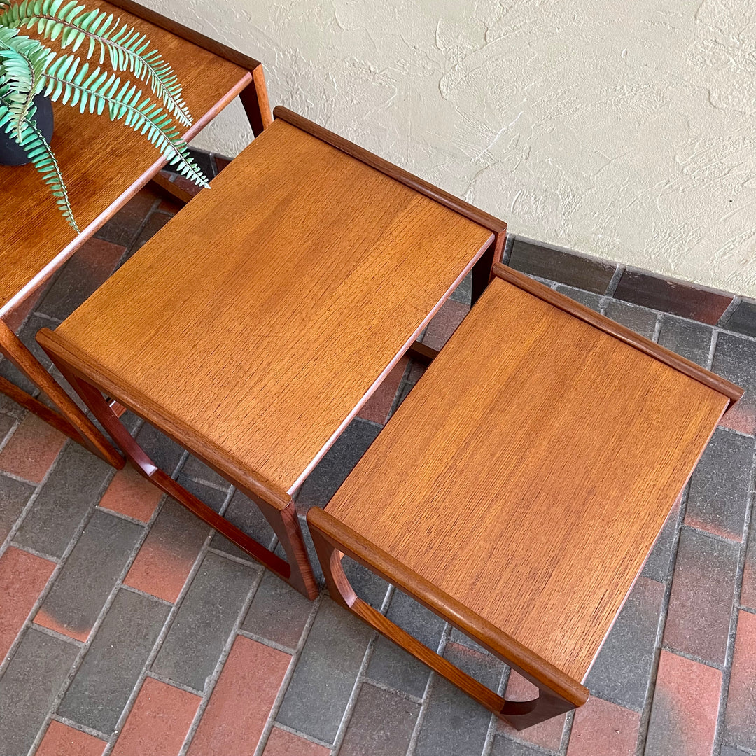 Vintage Nesting Tables by E. Gomme for G-Plan Perfect for adding versatility to any living space, these nesting tables offer both style and functionality, serving as side tables or separate accents. 