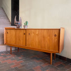 Mid century Modern R. Huber Teak Atomic Age Style Credenza with two sliding doors adjustable shelving and a drawer for storage | Record Storage | Mr. Mansfield Vintage 