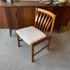 Angle top view of set of six teak dining chairs