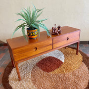 Designed by renowned Danish designer Kai Kristiansen, this piece embodies the clean lines, functional elegance, and exquisite craftsmanship characteristic of Scandinavian furniture design.