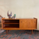 Load image into Gallery viewer, Mid century Modern R. Huber Teak Atomic Age Style Credenza with two sliding doors adjustable shelving and a drawer for storage | Record Storage | Mr. Mansfield Vintage 