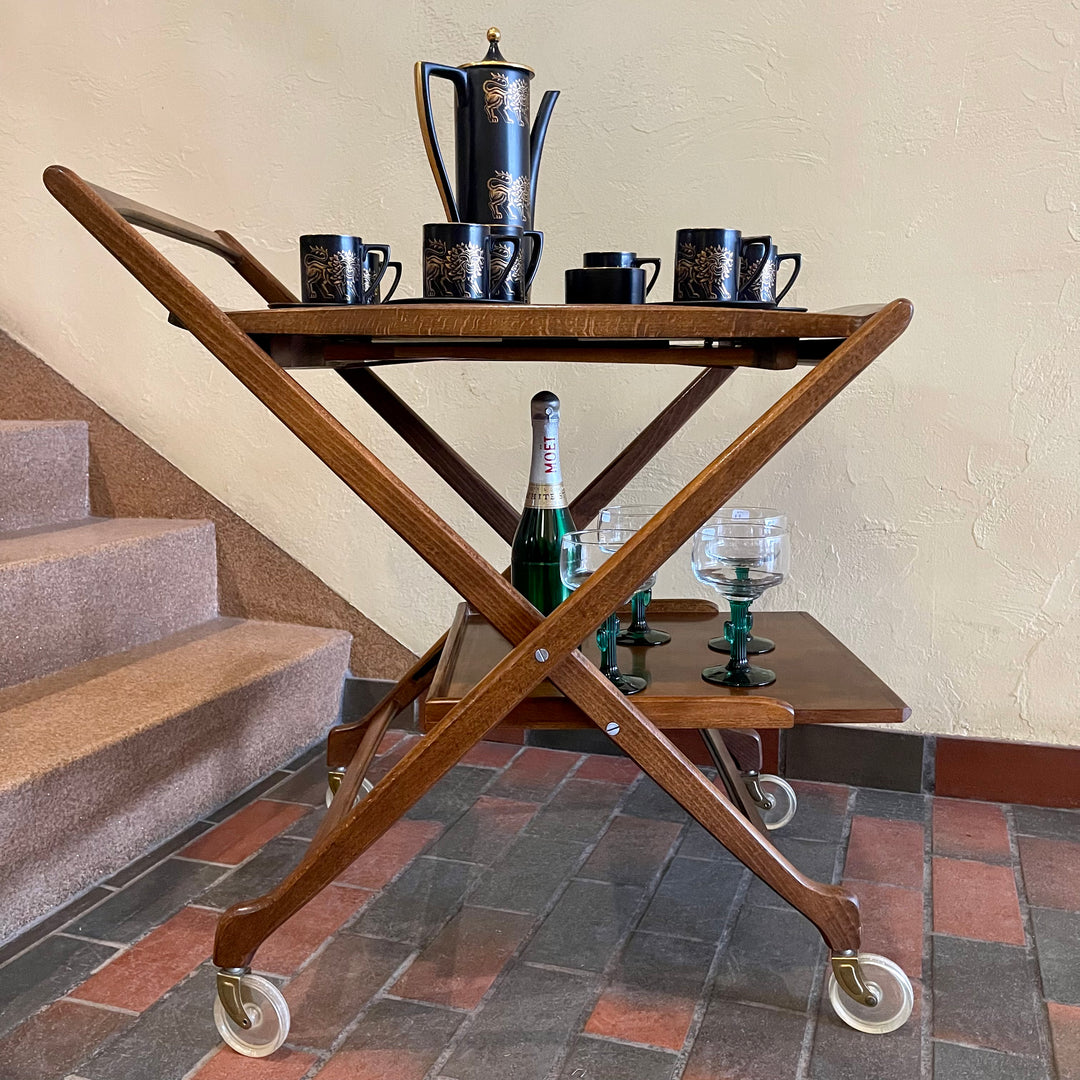 Made in Yugoslavia, this vintage Folding Tea | Bar Cart, is a versatile and charming piece that effortlessly combines functionality and style.