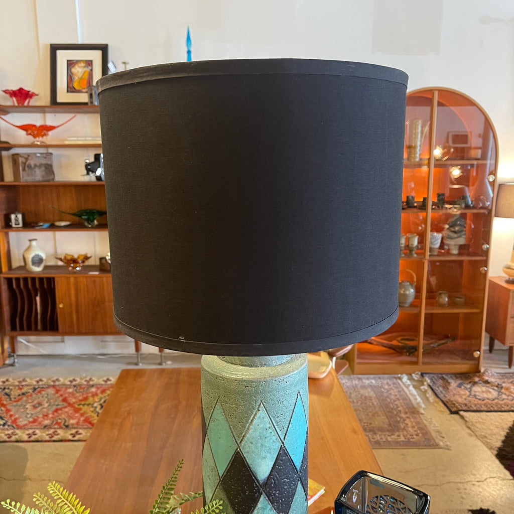 Front view of Bitossi ceramic table lamp with black drum shade