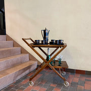 Made in Yugoslavia, this vintage Folding Tea | Bar Cart, is a versatile and charming piece that effortlessly combines functionality and style.