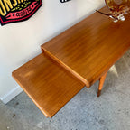 Side view of right extension on Johannes Andersen Danish modern teak table