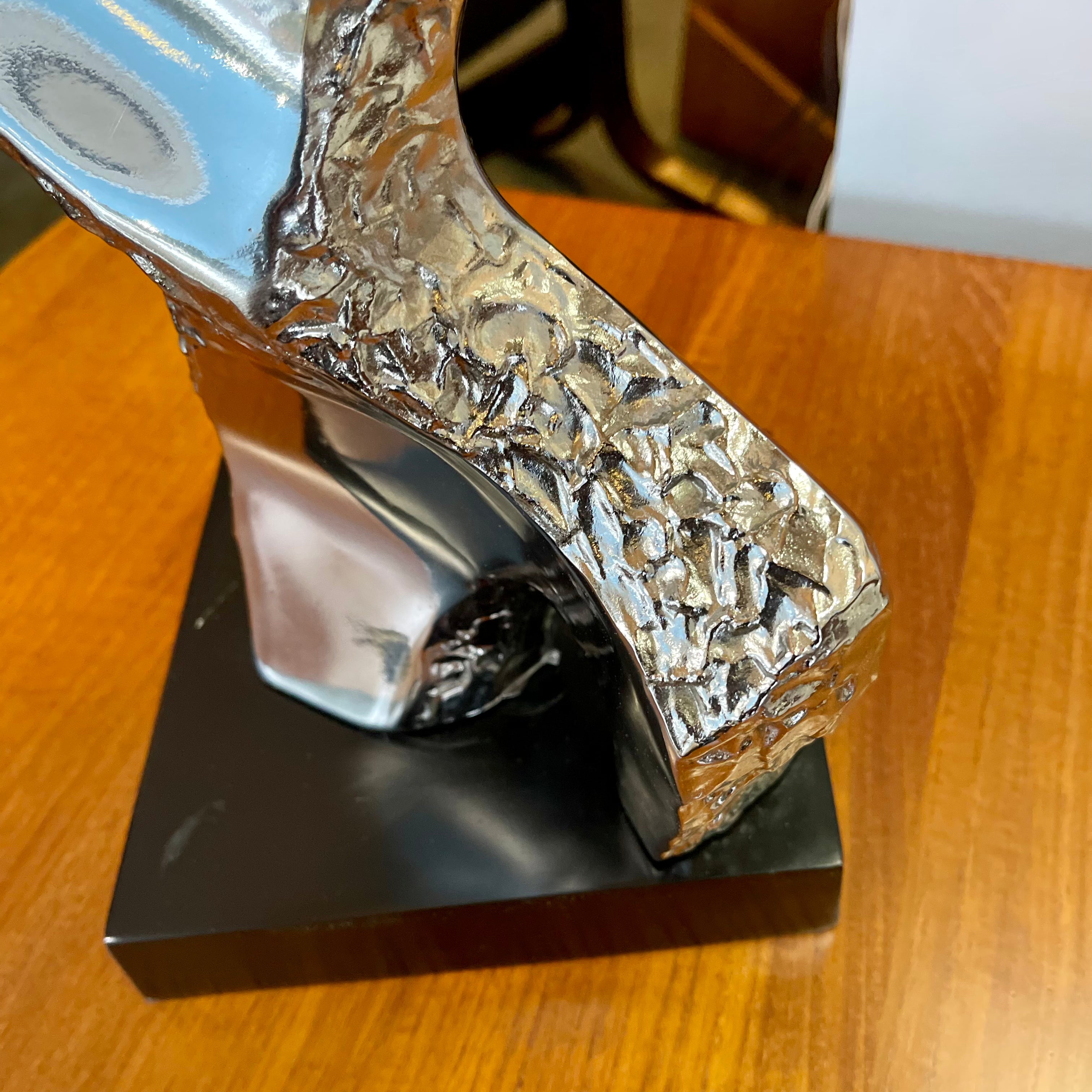 Richard Barr Brutalist Chrome Lamp for Laurel Lamp CoStanding as a testament to the Brutalist movement's influence on mid-century design, the lamp features a robust chrome base that exudes an air of strength and solidity. 