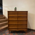 Load image into Gallery viewer, Crafted from rich walnut wood, this GIBBARD dresser boasts a warm, inviting tone that adds a touch of sophistication to any space.
