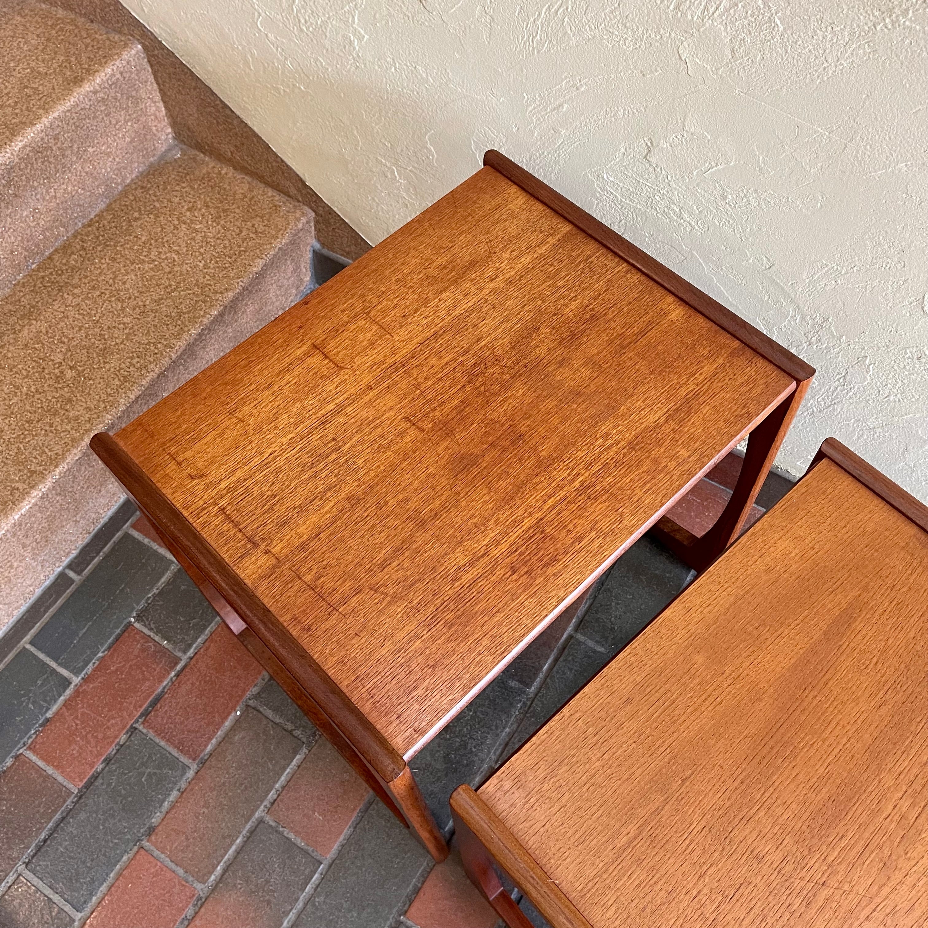 Vintage Nesting Tables by E. Gomme for G-Plan Perfect for adding versatility to any living space, these nesting tables offer both style and functionality, serving as side tables or separate accents. 