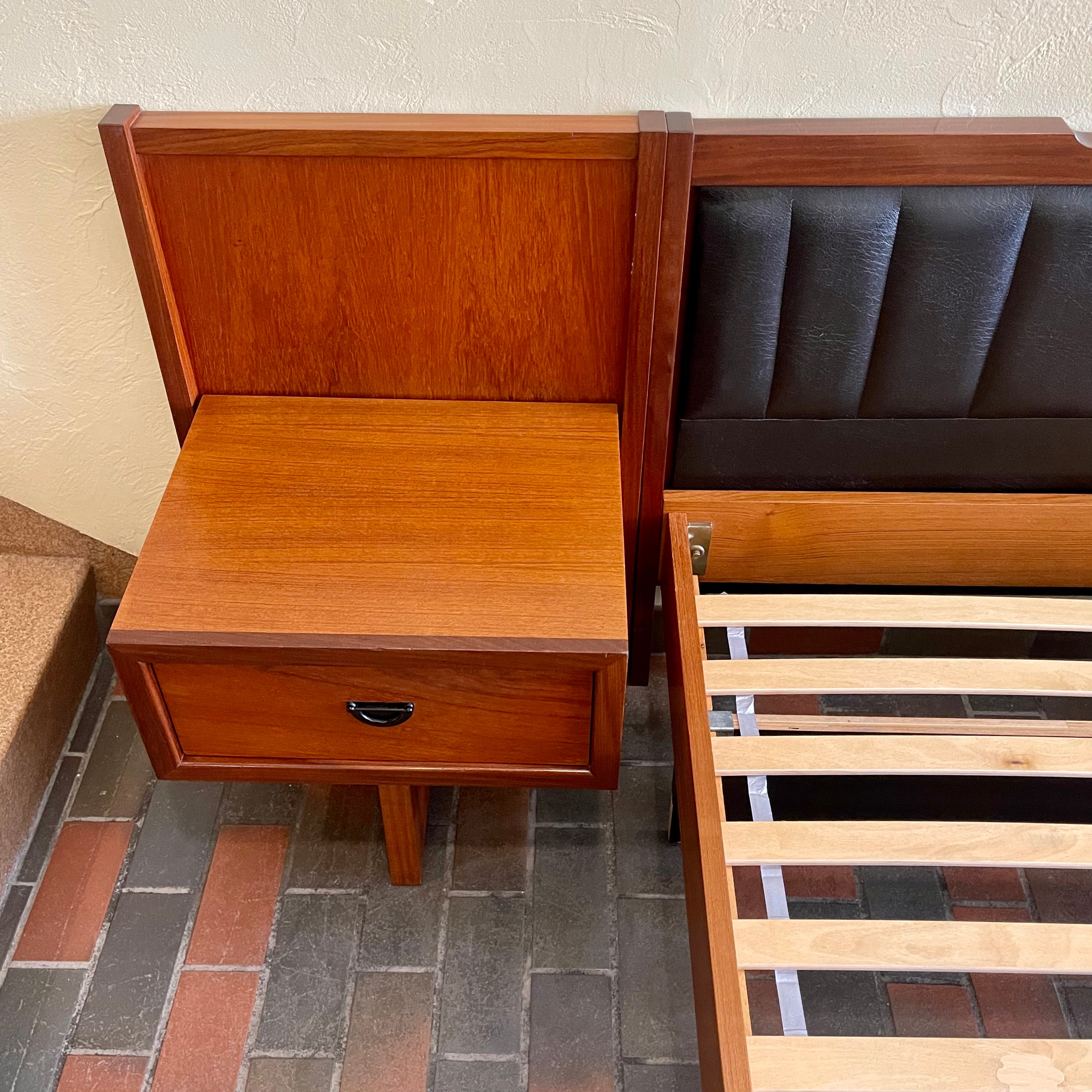 Warm teak grain on R.S. Associates mid-century bed headboard