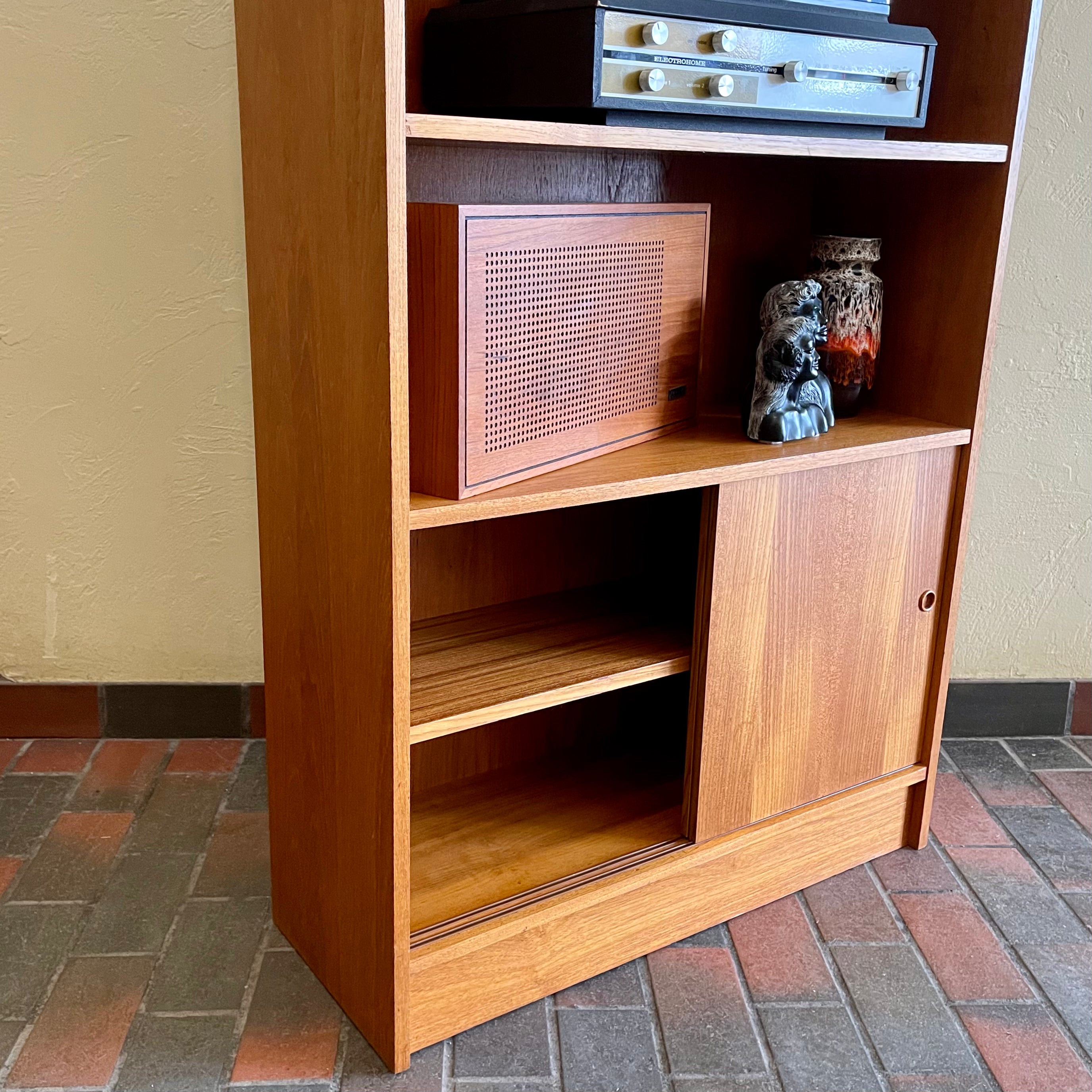 "Made in Denmark," this shelving unit not only provides a stylish platform to showcase your cherished records or favorite books but also offers functional storage solutions. 