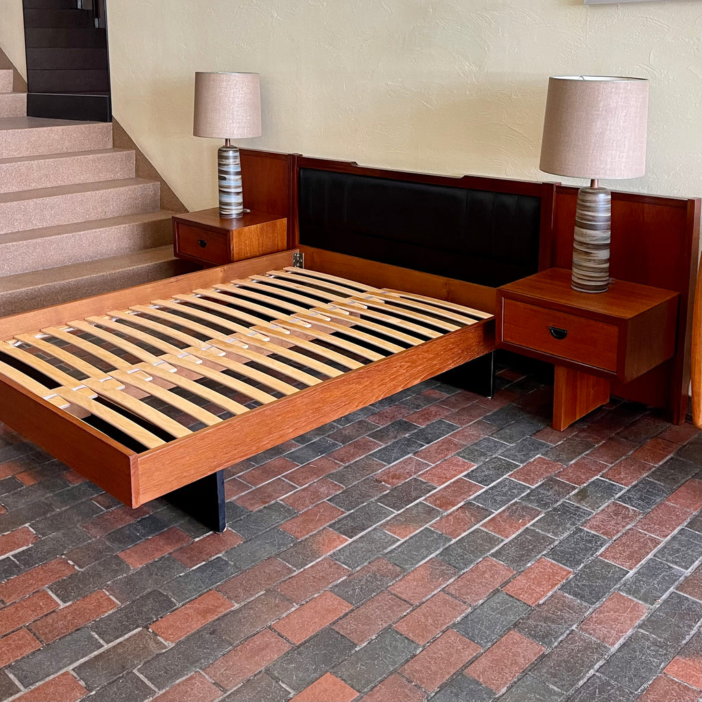 side view of Mid-century R.S. Associates teak bed with integrated bedside tables and double-size base