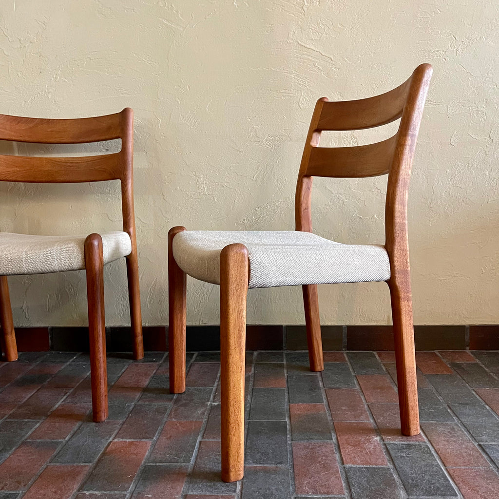 This set of six Danish Modern Solid Teak Dining Chairs from EMC Møbler showcase a sturdy craftsmanship and timeless design. Crafted from solid teak, these chairs feature a sleek and ergonomic silhouette, embodying the minimalist elegance characteristic of mid-century Danish furniture. 