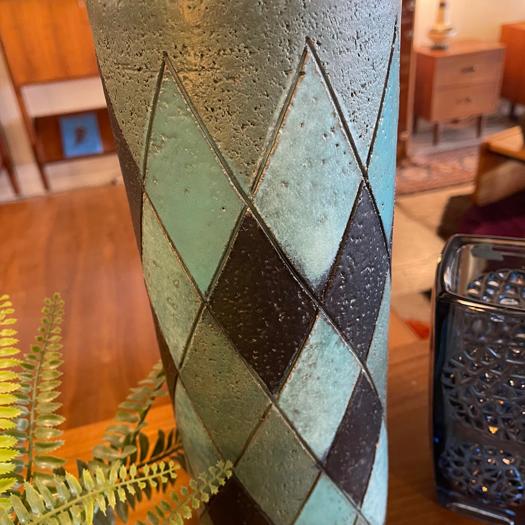 Close-up of turquoise and charcoal ceramic base on Bitossi lamp
