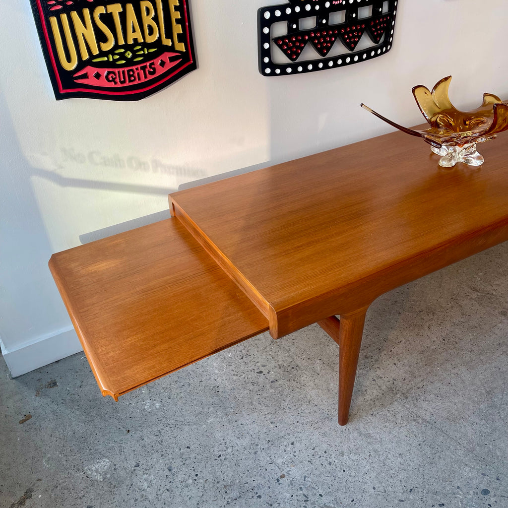 Top view of right pull-out extension on Johannes Andersen teak table