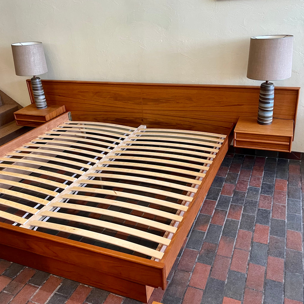 The centerpiece of any bedroom, this platform bed features a clean, minimalist design with a low-profile frame that offers a sense of spaciousness. The headboard, showcasing the natural beauty of teak, adds a touch of organic allure to the overall aesthetic. Its seamless integration with the floating nightstands on both sides creates a cohesive and balanced look.