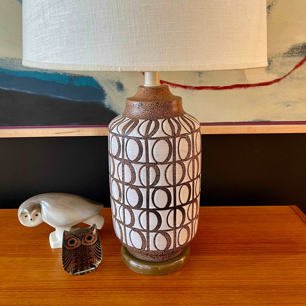  Mid Century Modern Pottery Lamp. Beautiful glazed geometric shapes adorn this pottery lamp. The  under glaze is black with brown specs and white glaze contrasting the shapes. | Mr. Mansfield Vintage 