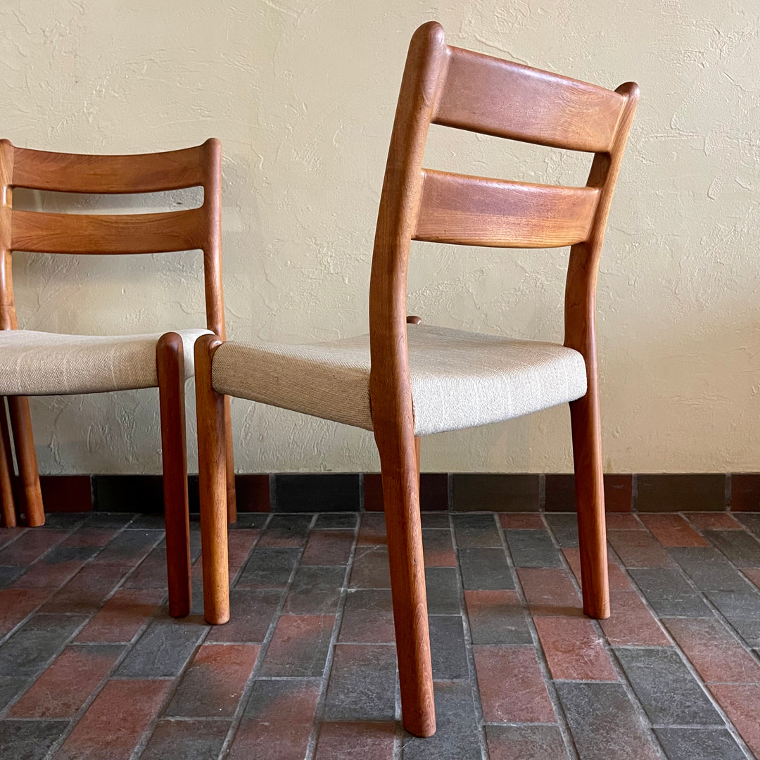 This set of six Danish Modern Solid Teak Dining Chairs from EMC Møbler showcase a sturdy craftsmanship and timeless design. Crafted from solid teak, these chairs feature a sleek and ergonomic silhouette, embodying the minimalist elegance characteristic of mid-century Danish furniture. 