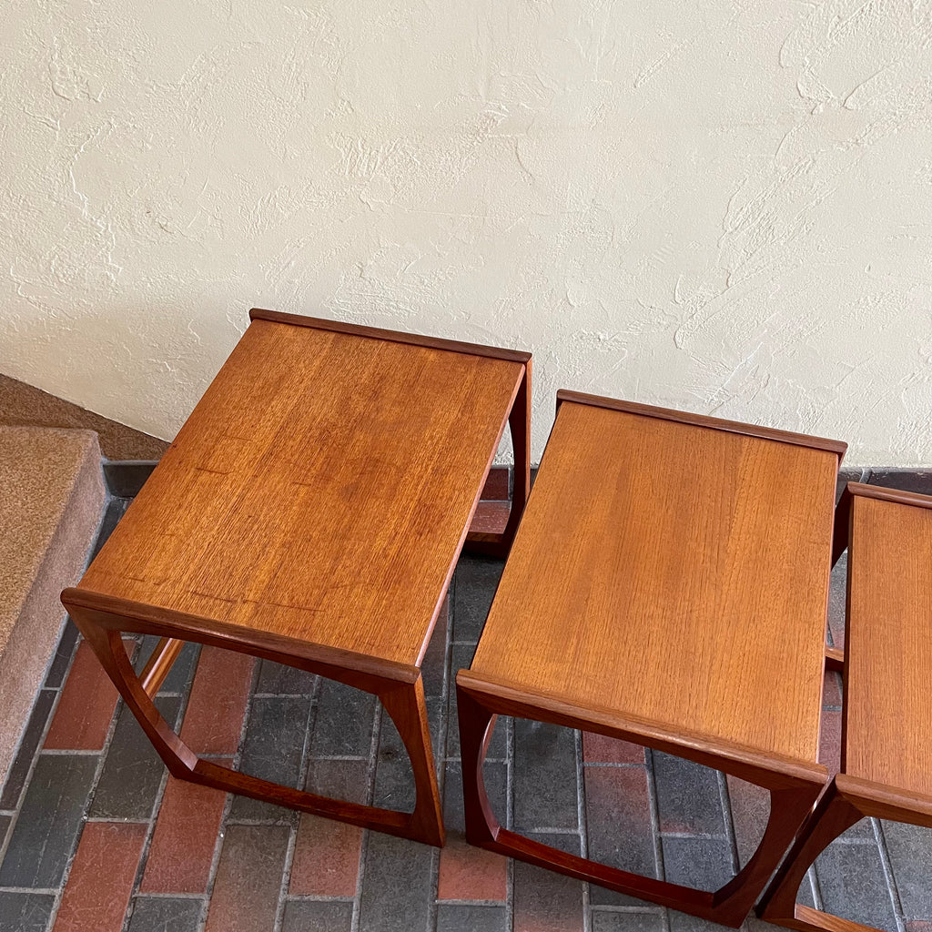 Vintage Nesting Tables by E. Gomme for G-Plan Perfect for adding versatility to any living space, these nesting tables offer both style and functionality, serving as side tables or separate accents. 