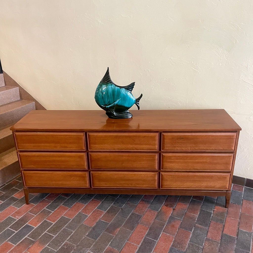Front view of HPL Furniture nine drawer walnut dresser
