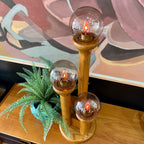 Top view of honey oak Space Age lamp with smoky globe shades