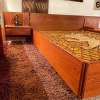 Mid-century teak bedroom set with platform bed, matching headboard panels and floating nightstands