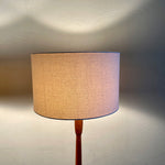 Load image into Gallery viewer,  Mid Century Teak Tri-pod Side Table Lamps,are crafted with the sophistication of mid-century design, these lamps boast a rich teak finish that exudes warmth and refinement. The slender tripod base gracefully elevates the table and the lamps, creating a harmonious balance between simplicity and style.