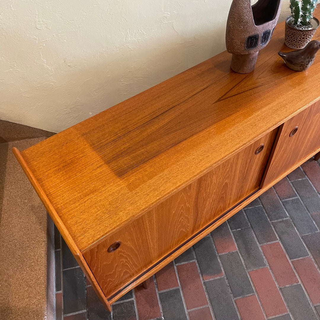 Mid century Modern R. Huber Teak Atomic Age Style Credenza with two sliding doors adjustable shelving and a drawer for storage | Record Storage | Mr. Mansfield Vintage 
