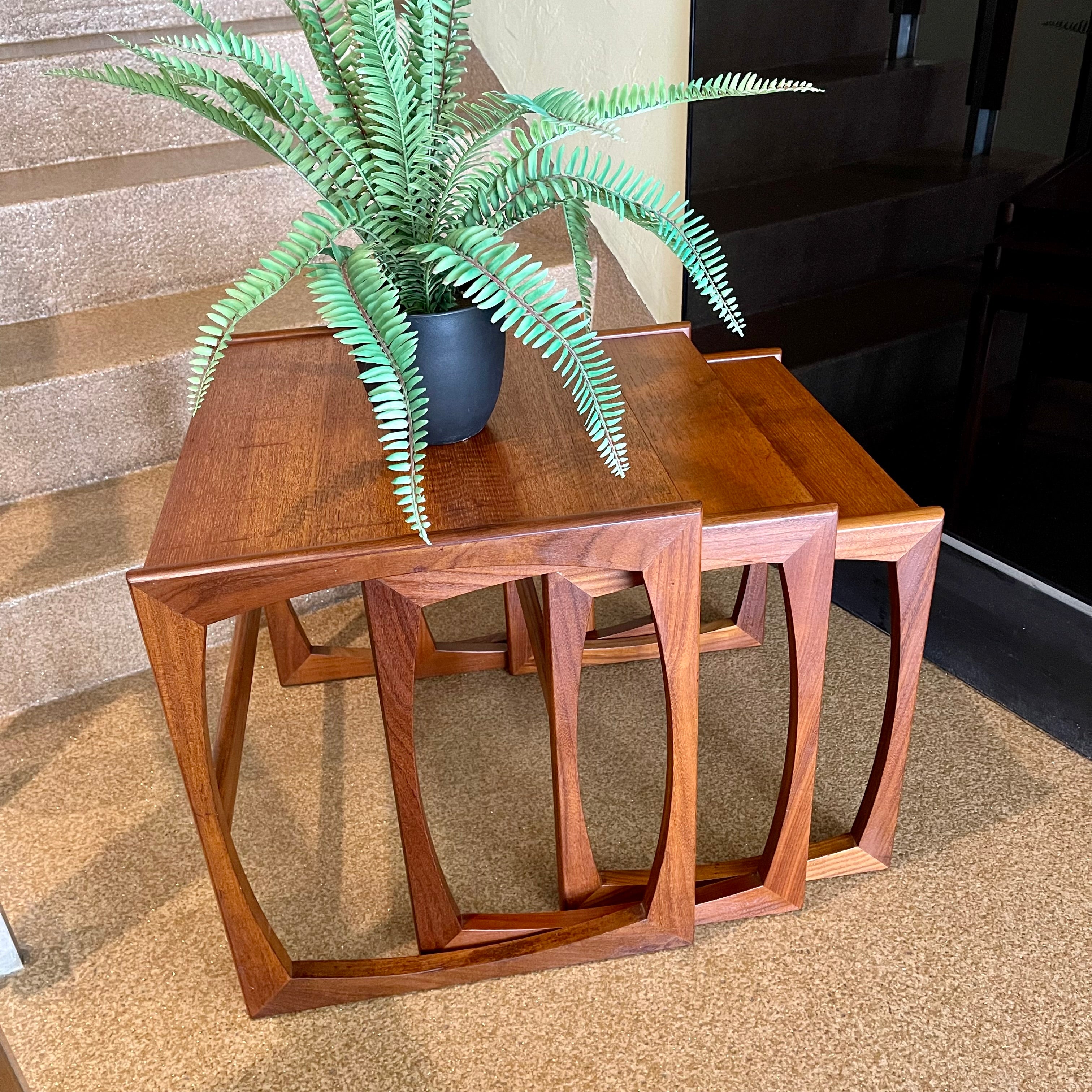 Vintage Nesting Tables by E. Gomme for G-Plan Perfect for adding versatility to any living space, these nesting tables offer both style and functionality, serving as side tables or separate accents. 