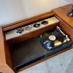 Vintage Electrohome solid state stereo console with turntable and wood cabinet