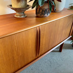 Close-up of tambour doors on Danish teak credenza