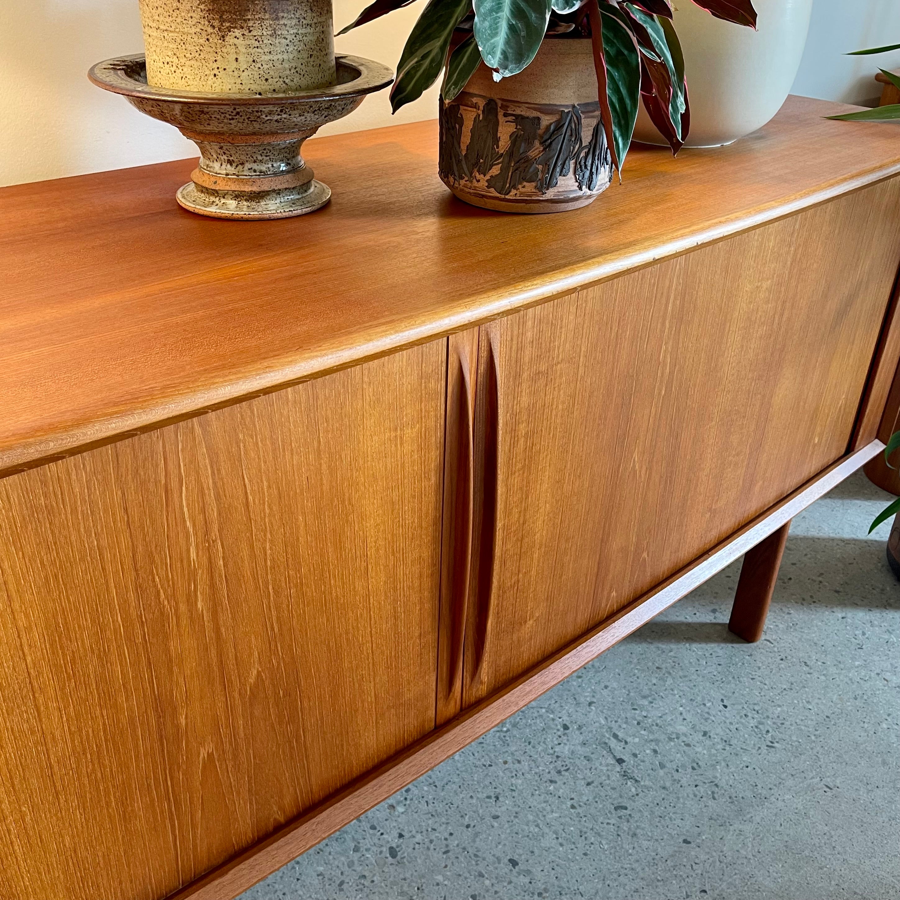 Close-up of tambour doors on Danish teak credenza