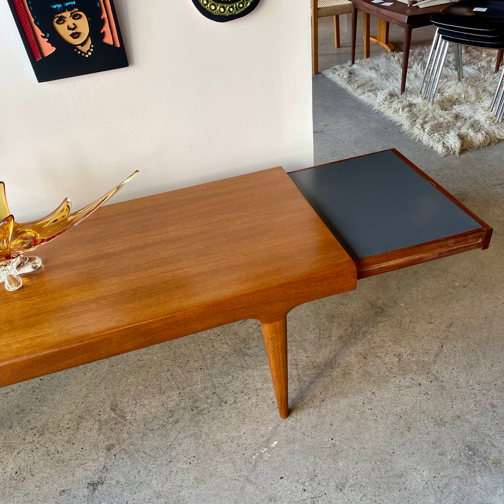 Johannes Andersen teak coffee table with both right side pull-out storage compartments extended