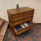 Crafted from rich walnut wood, this GIBBARD dresser boasts a warm, inviting tone that adds a touch of sophistication to any space.