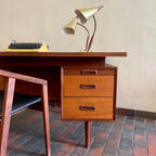 Three drawer side pedestal on RS Associates executive teak desk