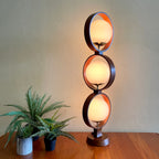 MODELINE Mid-Century Modern Globe Ring Lamp is a stunning three-tiered lighting fixture exuding a timeless Mid-Century Modern aesthetic. 