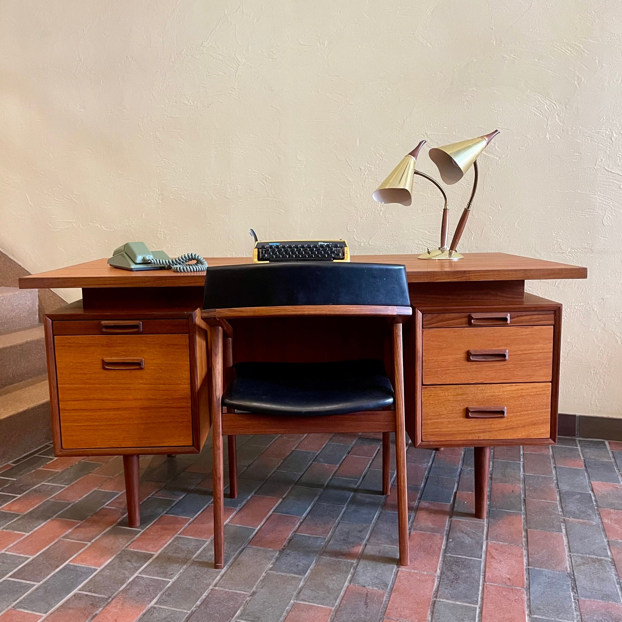 RS Associates executive teak desk with floating top and finished back