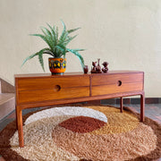 Designed by renowned Danish designer Kai Kristiansen, this piece embodies the clean lines, functional elegance, and exquisite craftsmanship characteristic of Scandinavian furniture design.