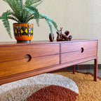 Designed by renowned Danish designer Kai Kristiansen, this piece embodies the clean lines, functional elegance, and exquisite craftsmanship characteristic of Scandinavian furniture design.