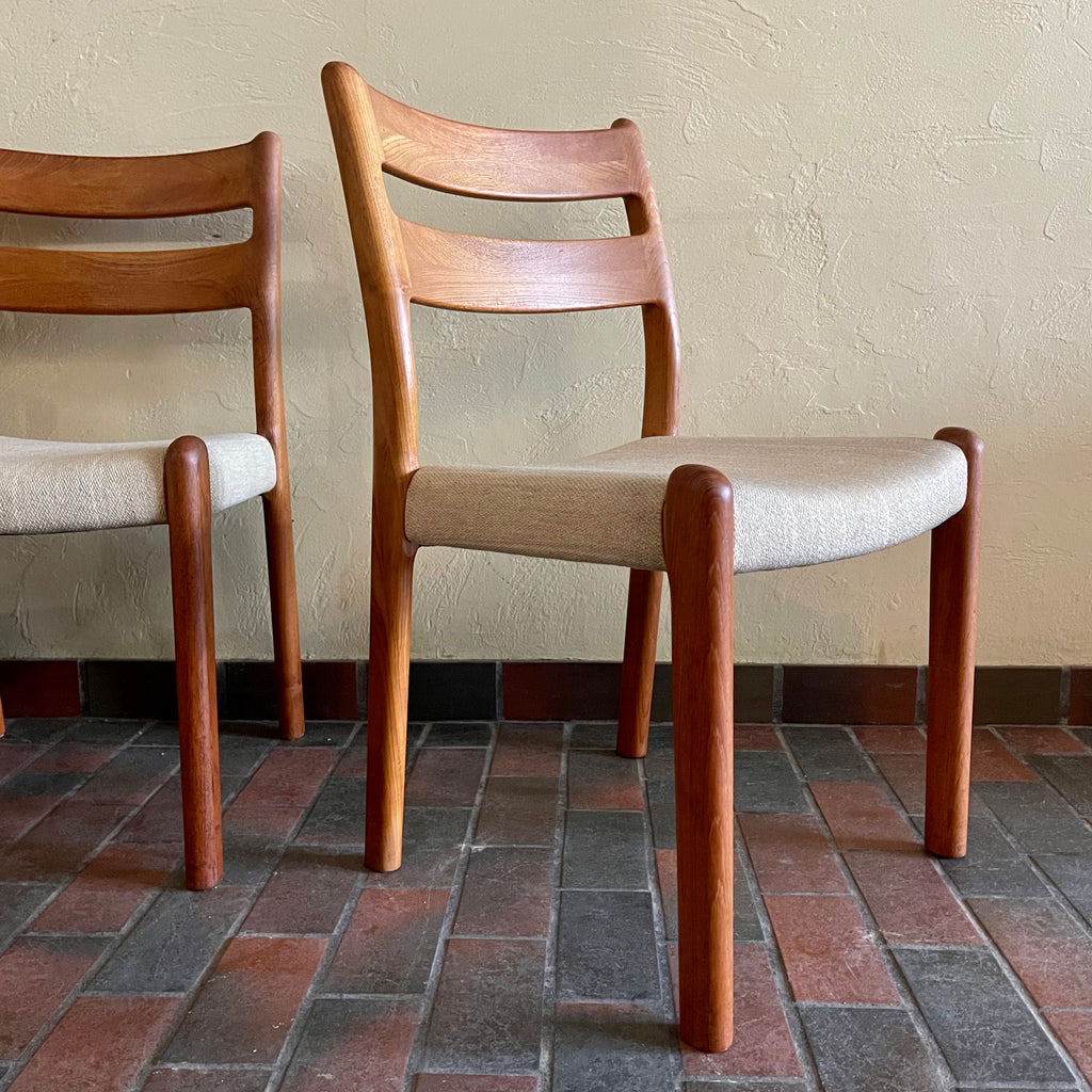 This set of six Danish Modern Solid Teak Dining Chairs from EMC Møbler showcase a sturdy craftsmanship and timeless design. Crafted from solid teak, these chairs feature a sleek and ergonomic silhouette, embodying the minimalist elegance characteristic of mid-century Danish furniture. 