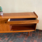 Mid century Modern R. Huber Teak Atomic Age Style Credenza with two sliding doors adjustable shelving and a drawer for storage | Record Storage | Mr. Mansfield Vintage 