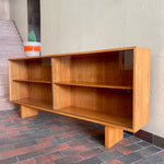 Load image into Gallery viewer,  Mid-century Teak Credenza | Hutch with Adjustable Shelving. This mid-century teak credenza | hutch is perfect for storing and displaying your items. Featuring two adjustable shelves, you can customize the configuration to suit your unique home. The timeless design is ideal for both office and home environments.
