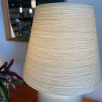 Close-up of white fiberglass shade on vintage LOTTE lamp