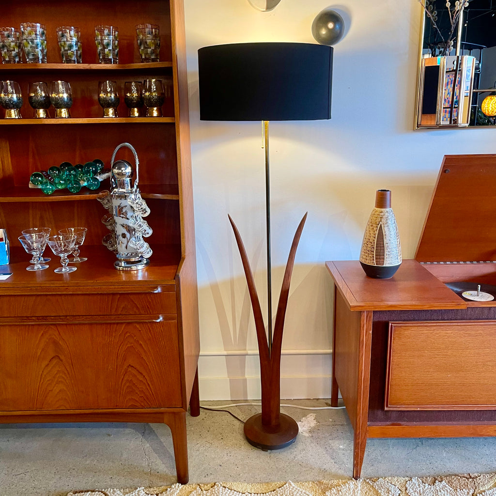 vintage mid-century walnut floor lamp with sculptural reed-inspired base and black drum shade with gold interior.