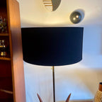 vintage mid-century walnut floor lamp with black drum shade with gold interiors.