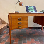 Load image into Gallery viewer, Mid Century Teak Finished Back Desk. This desk has a total of 6 dovetailed drawers, 3 on each side. The pulls are brass adding a classy touch. The two top drawers on either side have locks (missing the key)  The back of the desk is beautifully finished  with teak panels, perfect to place in the middle of the room. 