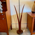 vintage mid-century walnut floor lamp with sculptural reed-inspired base.