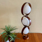 MODELINE Mid-Century Modern Globe Ring Lamp is a stunning three-tiered lighting fixture exuding a timeless Mid-Century Modern aesthetic. 