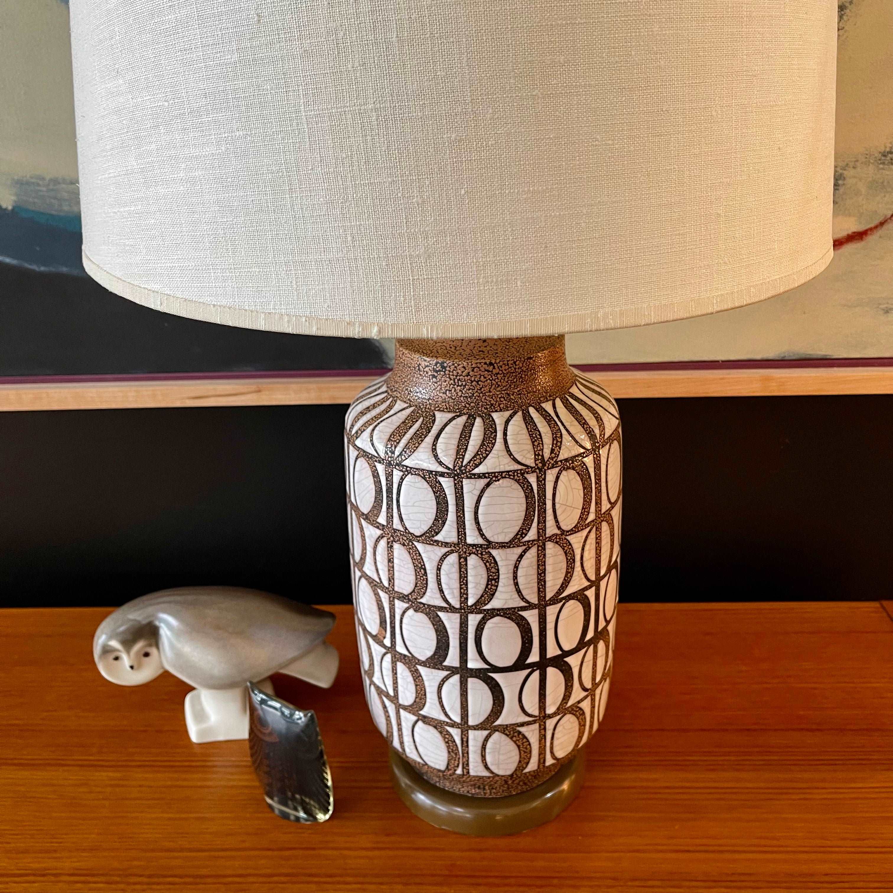  Mid Century Modern Pottery Lamp. Beautiful glazed geometric shapes adorn this pottery lamp. The  under glaze is black with brown specs and white glaze contrasting the shapes. | Mr. Mansfield Vintage 